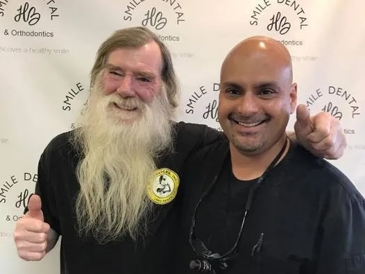 Dr. Subodh with a happy patient at Smile HB Dental and Orthodontics in Huntington Beach, CA